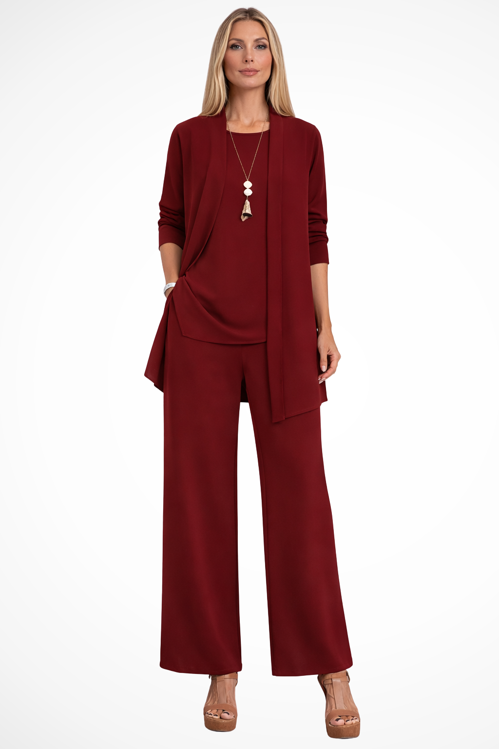 Set completo donna elegante con pantaloni larghi. Look ufficio, cardigan donna e top coordinato per stile moderno.