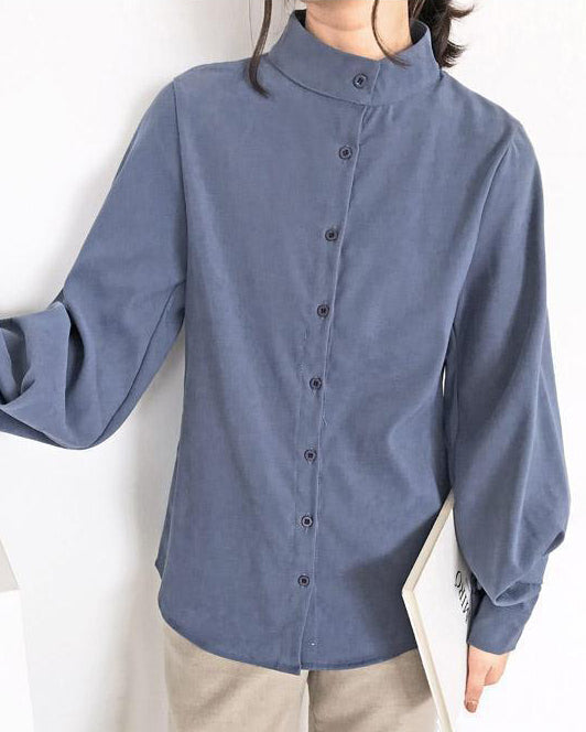 Top donna elegante con maniche a sbuffo, camicia perfetta per un look di primavera/autunno e moda chic.