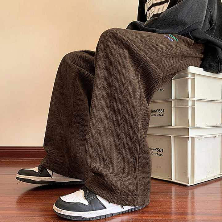 Pantaloni uomo streetwear microelastici tinta unita. Modello termico casual per un inverno caldo e alla moda.