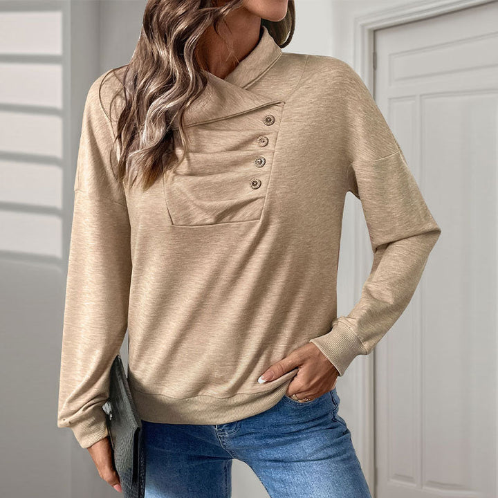 Maglione donna autunnale color khaki con bottoni decorativi e dettagli pieghettati. Perfetto per un look casual elegante.