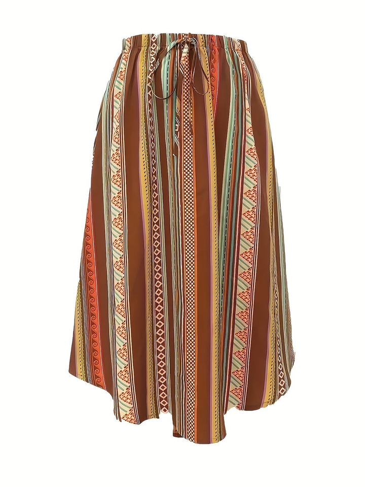 Gonna midi donna asimmetrica con fantasia geometrica per un outfit estivo versatile e di tendenza, stile moderno.