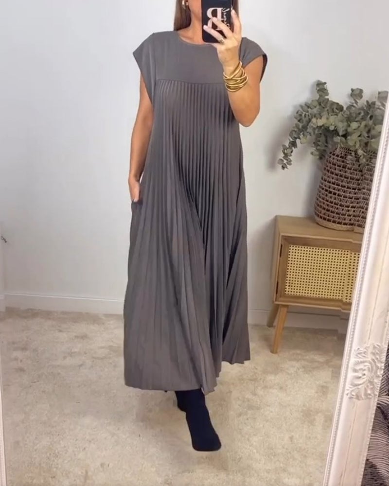 Elegante abito plissettato maxi da donna, fluido e comodo, perfetto come vestito da cerimonia.