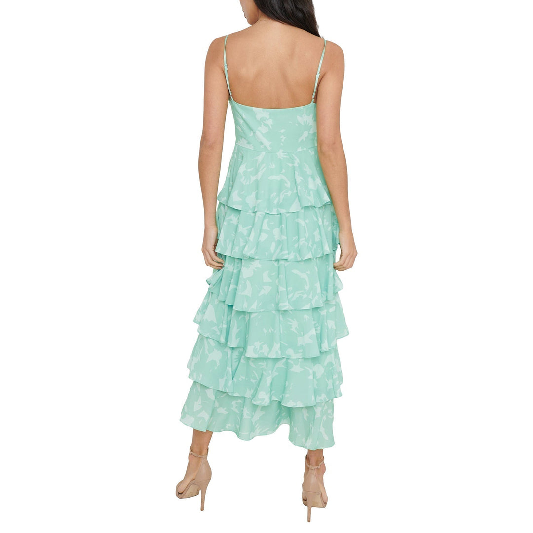 Abito lungo donna moda mare, senza maniche e stampa foglie, un must-have per le tue vacanze.