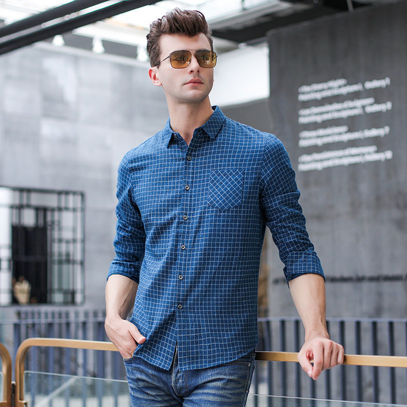 Camicia uomo a quadri blu e grigi con collo a revers, maniche lunghe. Perfetta per look autunnali eleganti o casual.