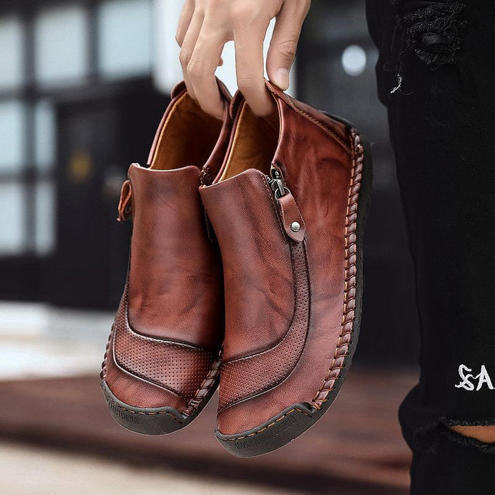 Stivali uomo casual punta tonda, design robusto e confortevole per l'uso quotidiano in inverno.