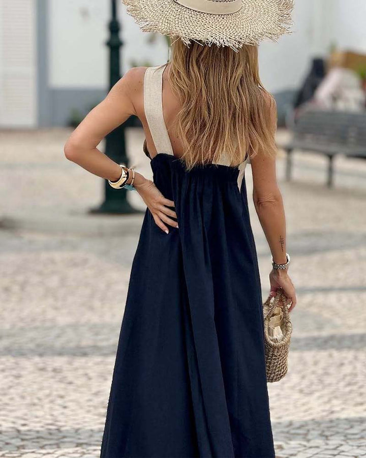 Vestito lungo fluido incrociato da donna, colore versatile. Perfetto per eleganza quotidiana.