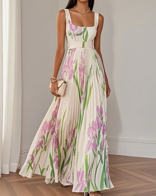 Look femminile con abito estivo lungo floreale, plissettato, spalline sottili. Perfetto per eleganza e moda mare.