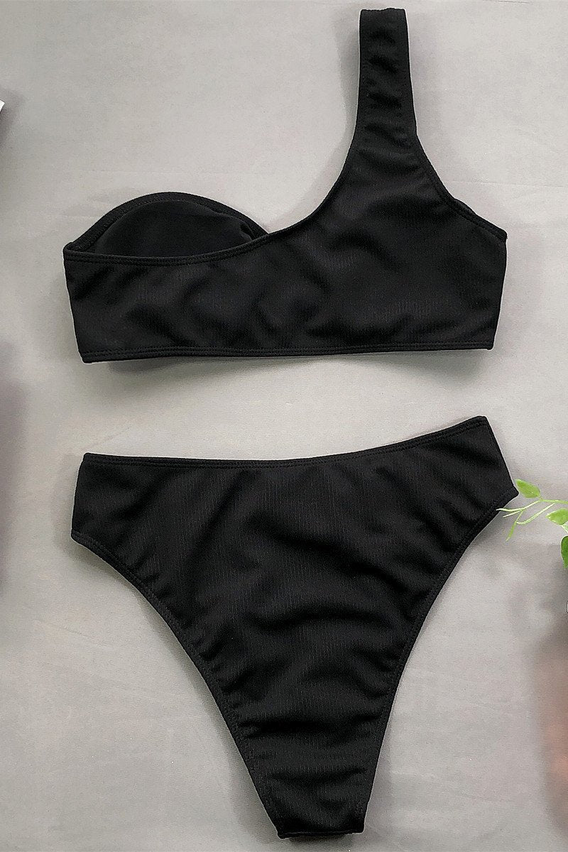 Costume da bagno bikini donna monospalla verde neon e nero, slip vita alta imbottito. Stile elegante per l'estate.