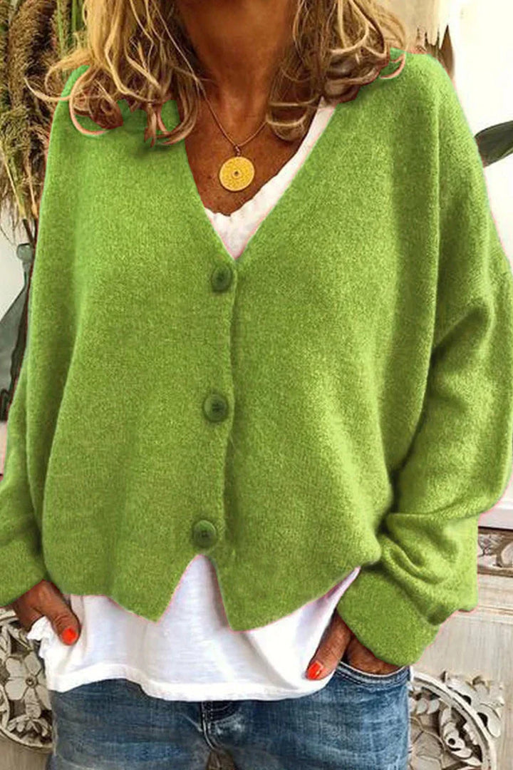 Elegante cardigan donna stile patchwork, capo versatile per look autunno-inverno e calore.