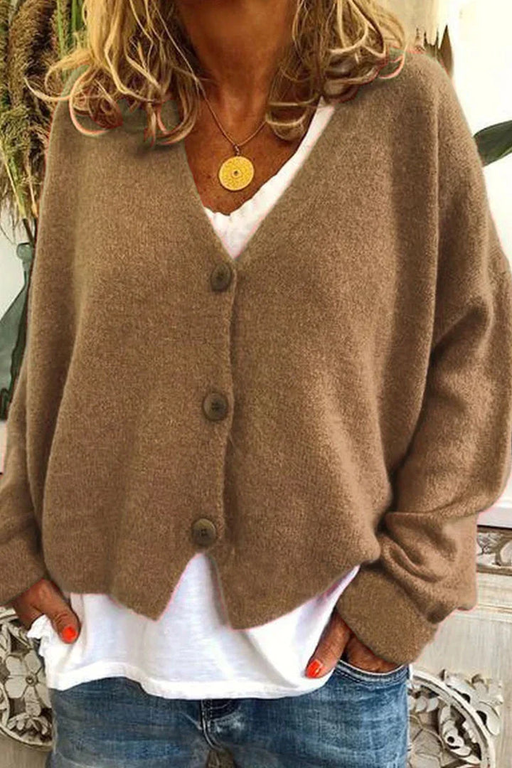 Cardigan donna elegante e caldo, perfetto per comfort quotidiano e moda autunno/inverno.