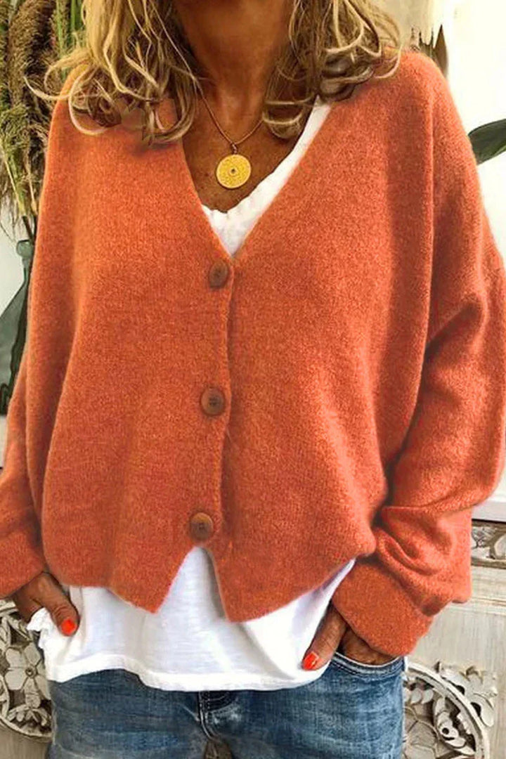Cardigan donna autunnale, elegante e comodo, con design patchwork unico e calore.