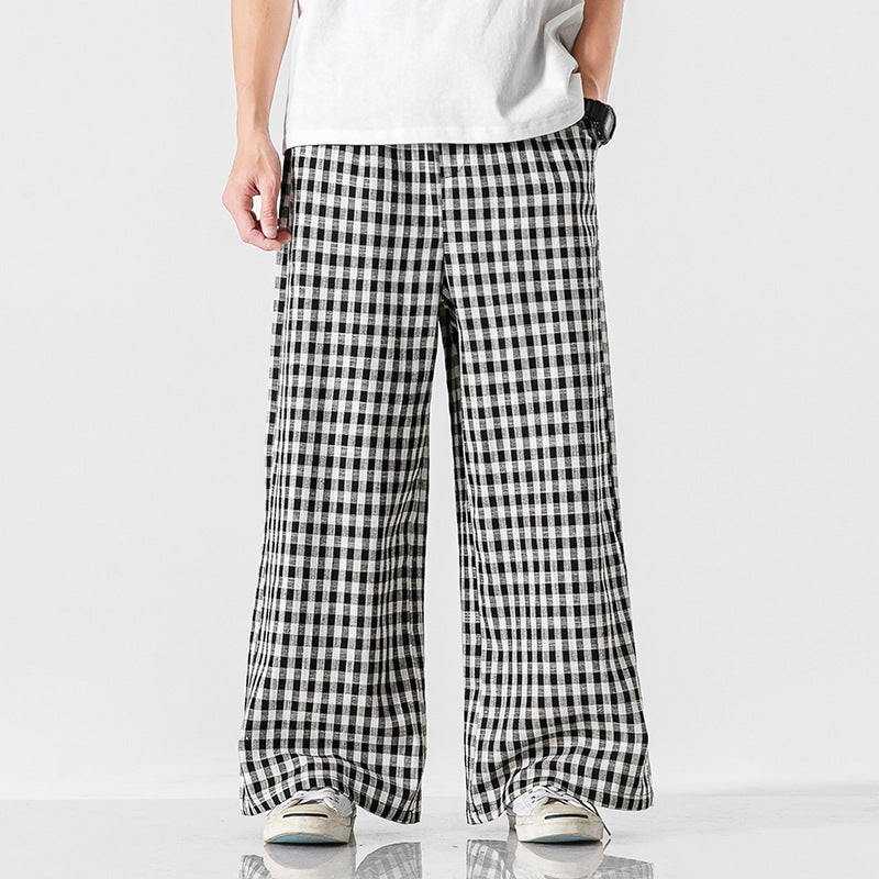 Pantaloni ampi uomo estivi a quadri, ideali per tempo libero e relax. Stile casual e massima libertà di movimento.