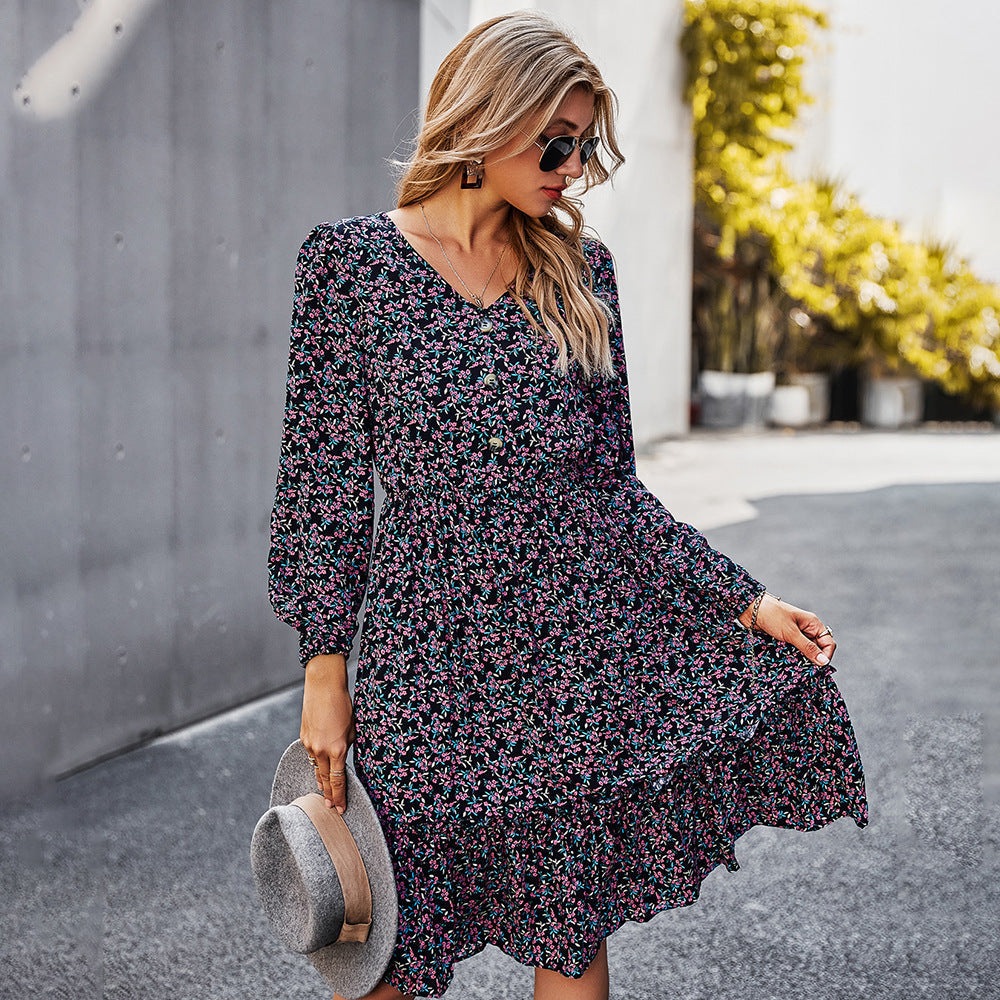 Elegante abito midi floreale da donna con scollo a V profondo e maniche lunghe. Ideale per look casual chic.