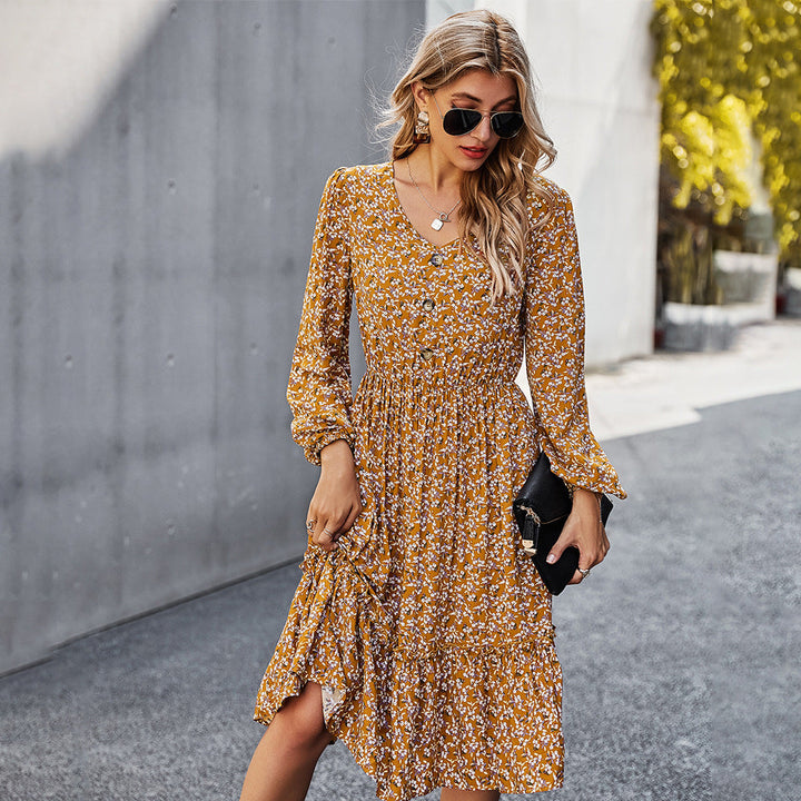 Abito donna midi floreale con scollo a V. Design comodo ed elegante, perfetto per la moda femminile di tendenza.