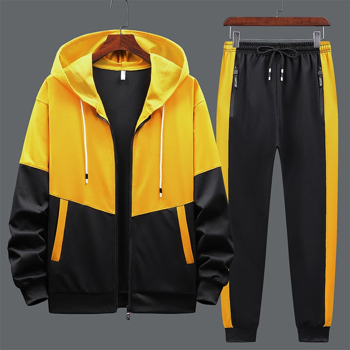 Tuta sportiva casual da uomo, due pezzi, confortevole e versatile per ogni stagione, ideale per sport o relax.
