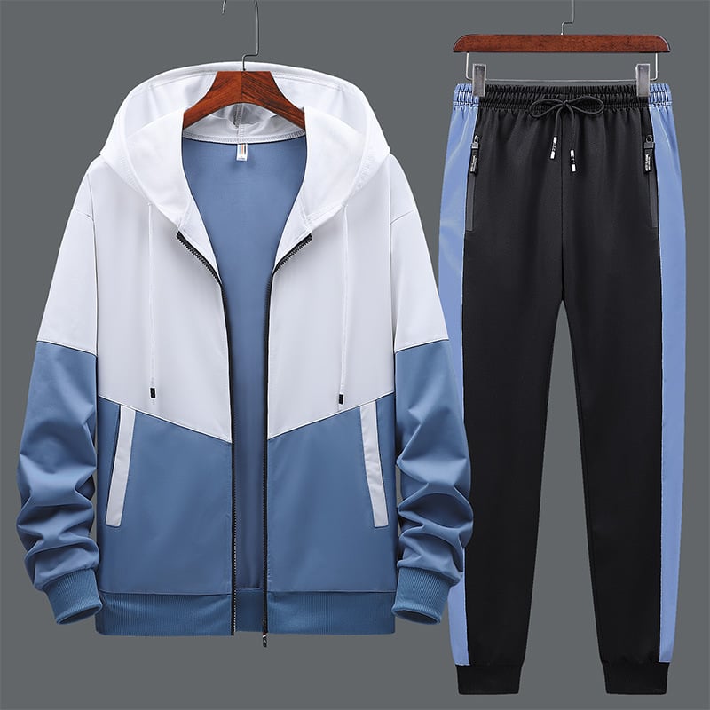 Tuta sportiva da uomo completa con felpa con cappuccio e pantaloni, ideale per look casual e tempo libero.