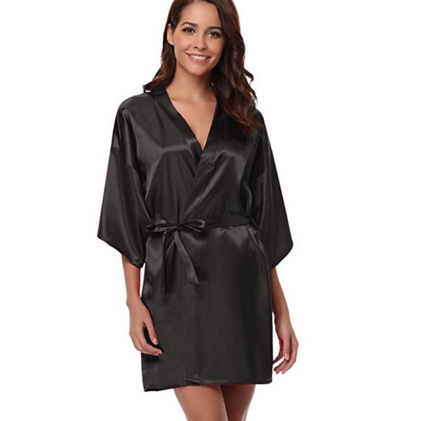 Vestaglia Kimono donna elegante senza maniche per casa, stile moderno e comodo.
