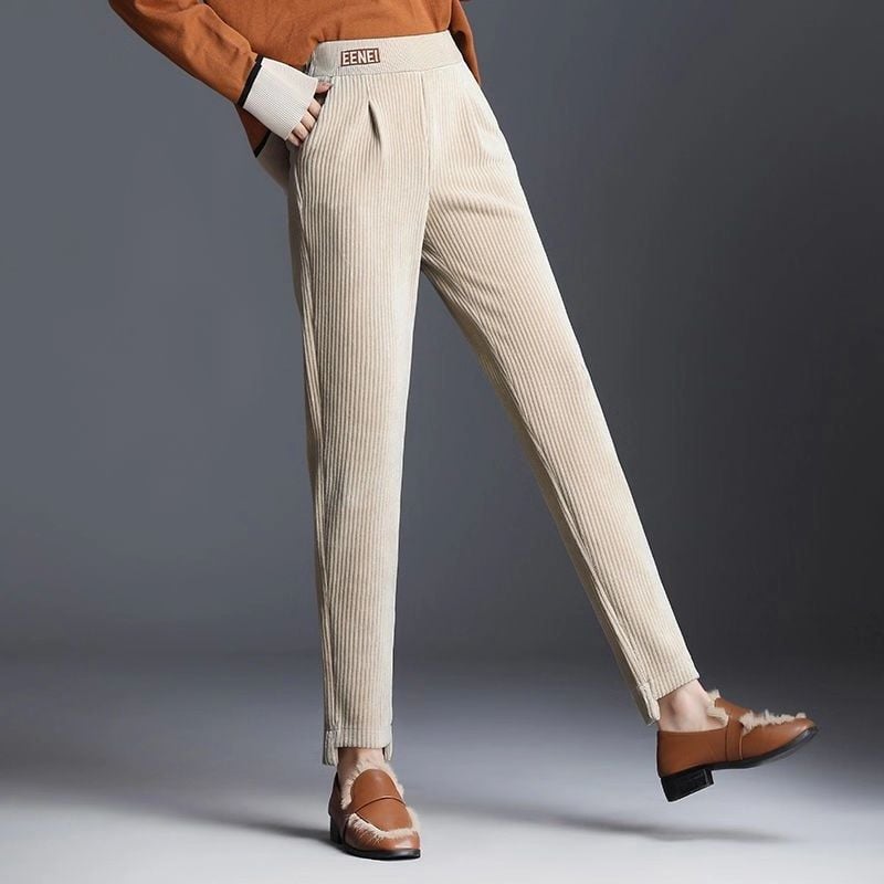 Pantaloni harem donna albicocca cropped, vestibilità ampia. Ideali per look autunnali casual chic e comfort quotidiano.