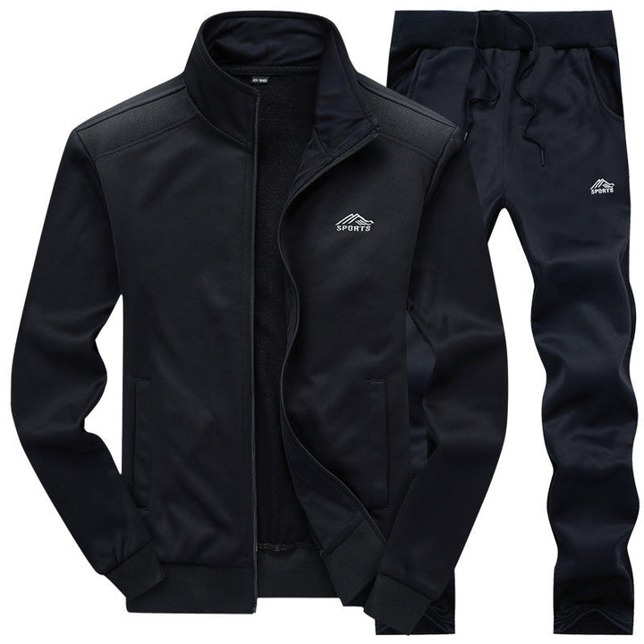 Tuta sportiva uomo completa, ideale per allenamento in palestra o look casual. Offre comfort e stile dinamico.