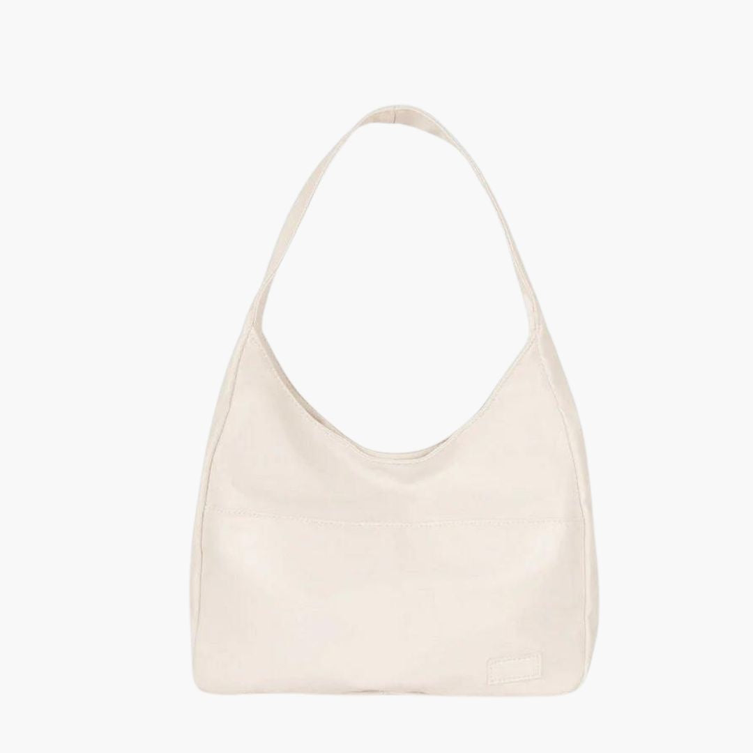 Borsa hobo donna, accessorio moda femminile dallo stile minimal versatile, ideale per un look casual.