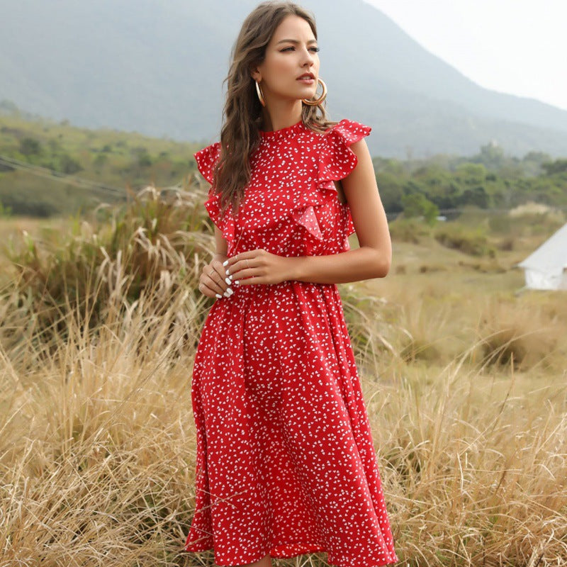 Abito lungo estivo donna a pois bianco e nero, con gonna fluida a linea A. Perfetto per outfit casual ed eleganti.