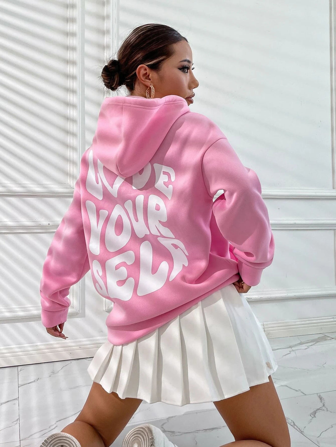 Felpa da donna morbida con cappuccio, abbigliamento casual ideale per autunno e inverno.