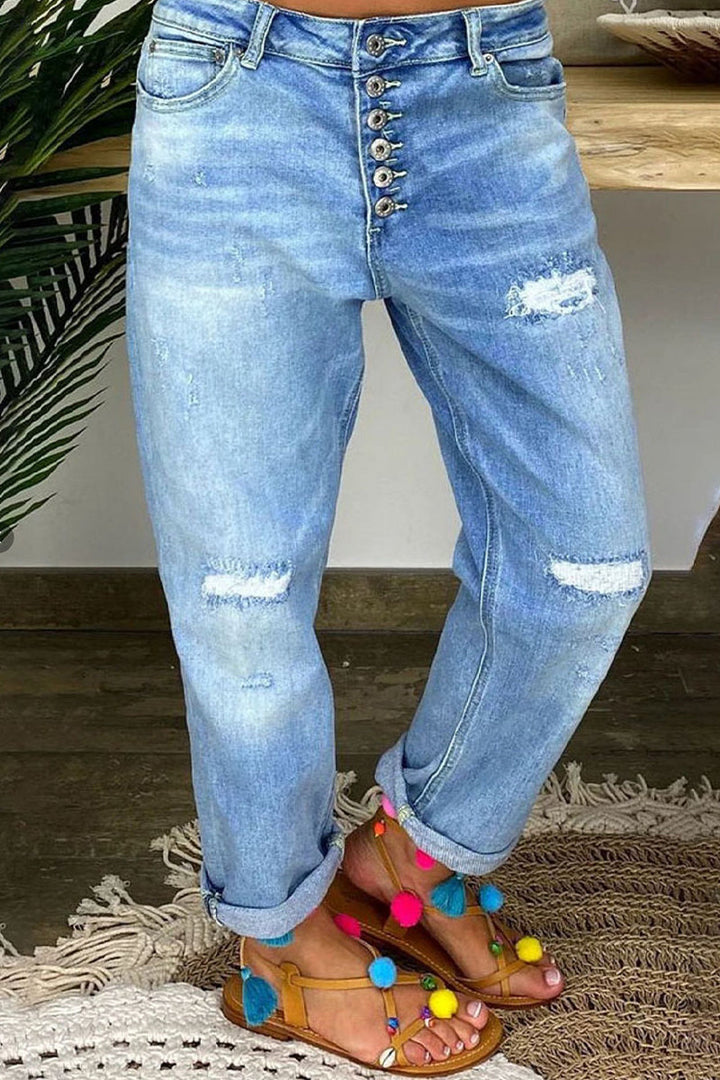 Jeans strappati vita bassa donna azzurro chiaro, stile casual trendy per un look streetwear confortevole.