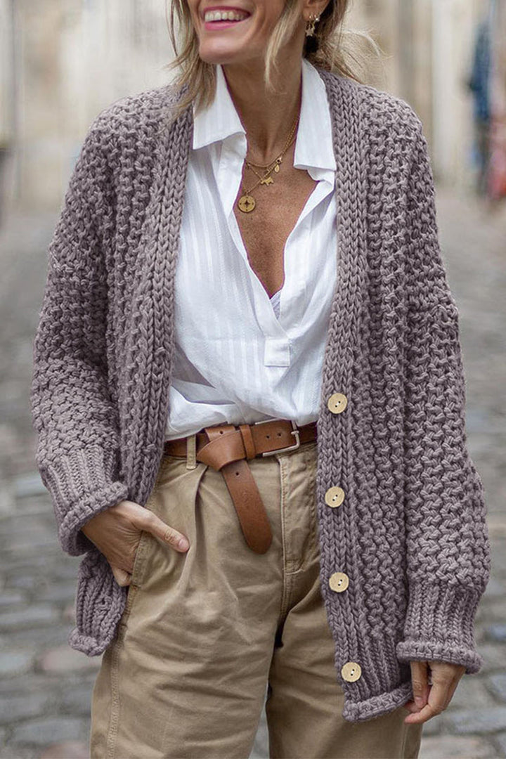 Cardigan donna autunnale/invernale oversize a coste, in maglieria spessa. Perfetto per uno stile elegante e casual.