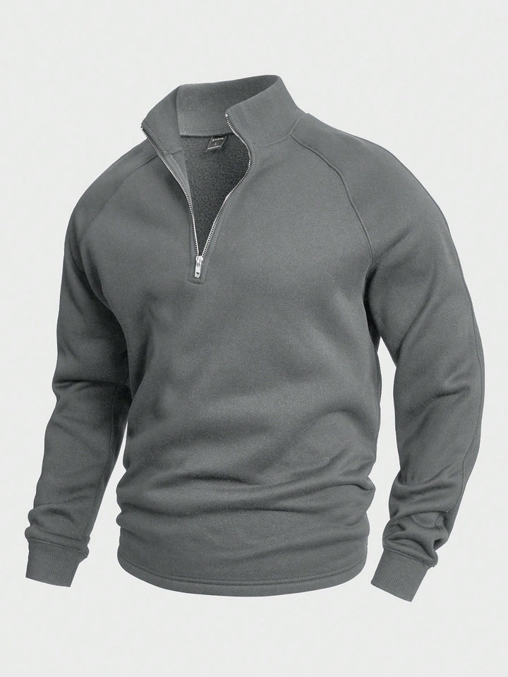 Elegante maglione mezza zip uomo, collo alto, per un look maschile versatile e comodo.