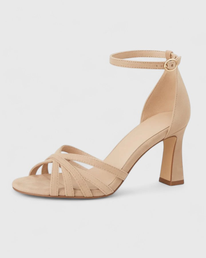 Décolleté donna eleganti con cinturino alla caviglia e tacco largo, perfette per serate e cerimonie.