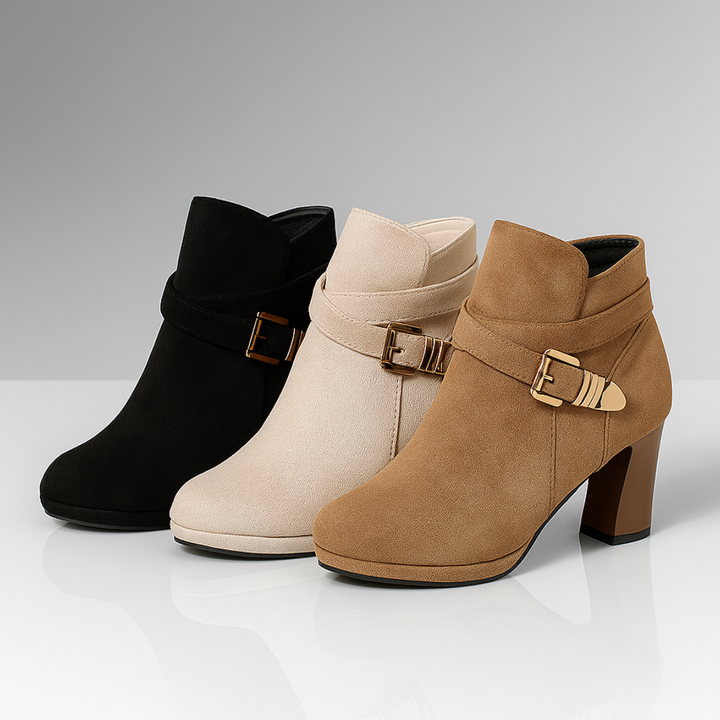 Stivaletti donna casual-eleganti per l'autunno. Tacchi comodi e fibbia oro rendono queste calzature molto versatili.