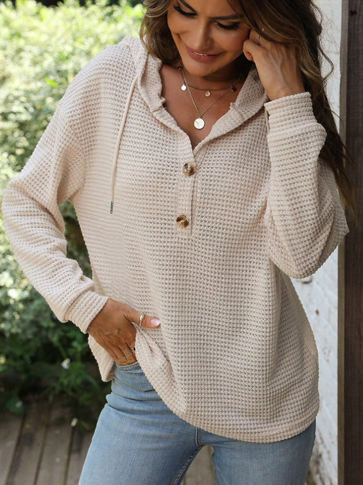 Felpa donna autunno inverno con cappuccio e bottoni, stile casual e vestibilità comoda.