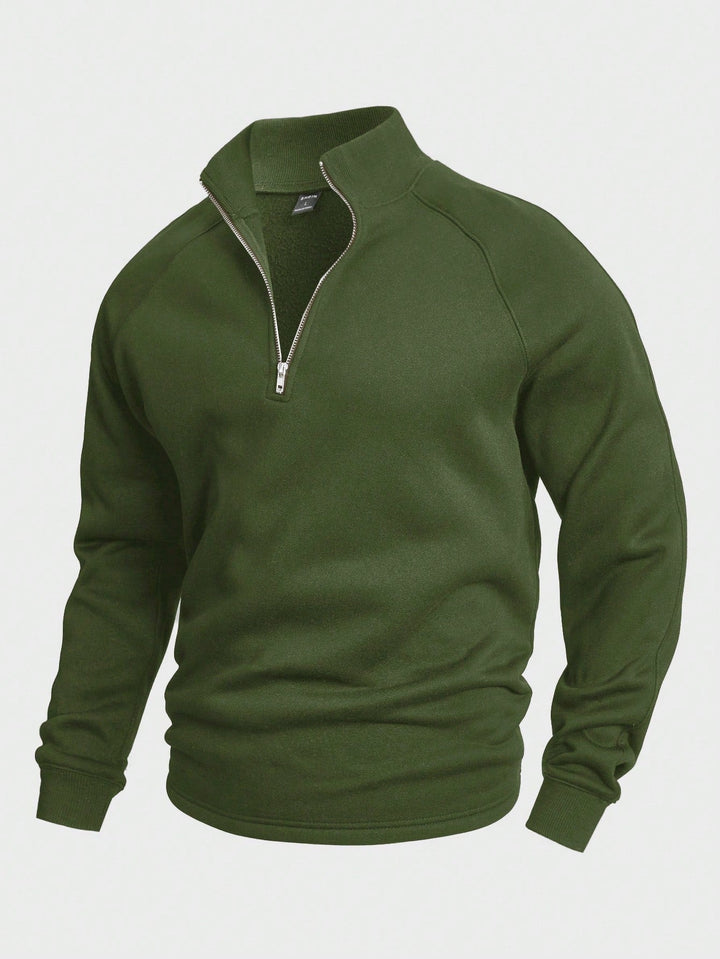 Maglione uomo mezza zip a collo alto, in morbido tessuto, per comfort e stile casual maschile.