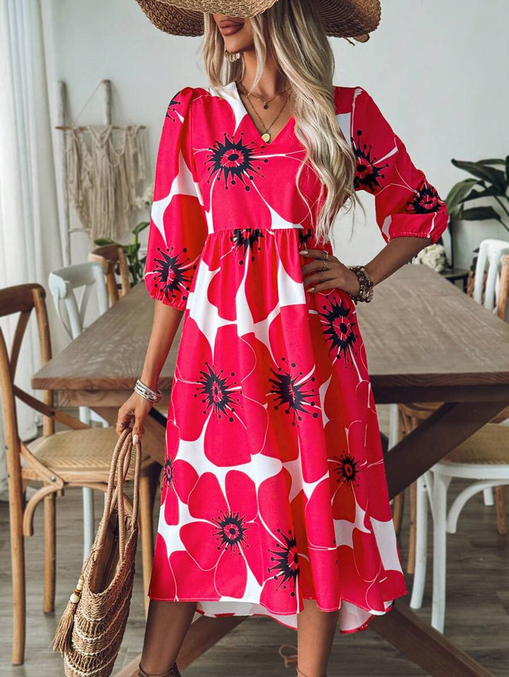 Abito maxi floreale colorato da donna, ideale per un look estivo chic e confortevole per ogni occasione.