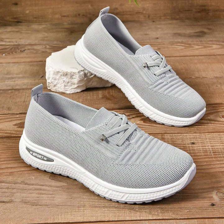 Sneakers comode grigie slip-on per donna. Ideali per praticità, comfort e uno stile casual versatile.