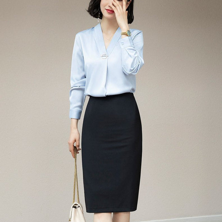 Gonna ufficio invernale donna slim fit, sotto ginocchio. Stile raffinato e professionale per la moda femminile.