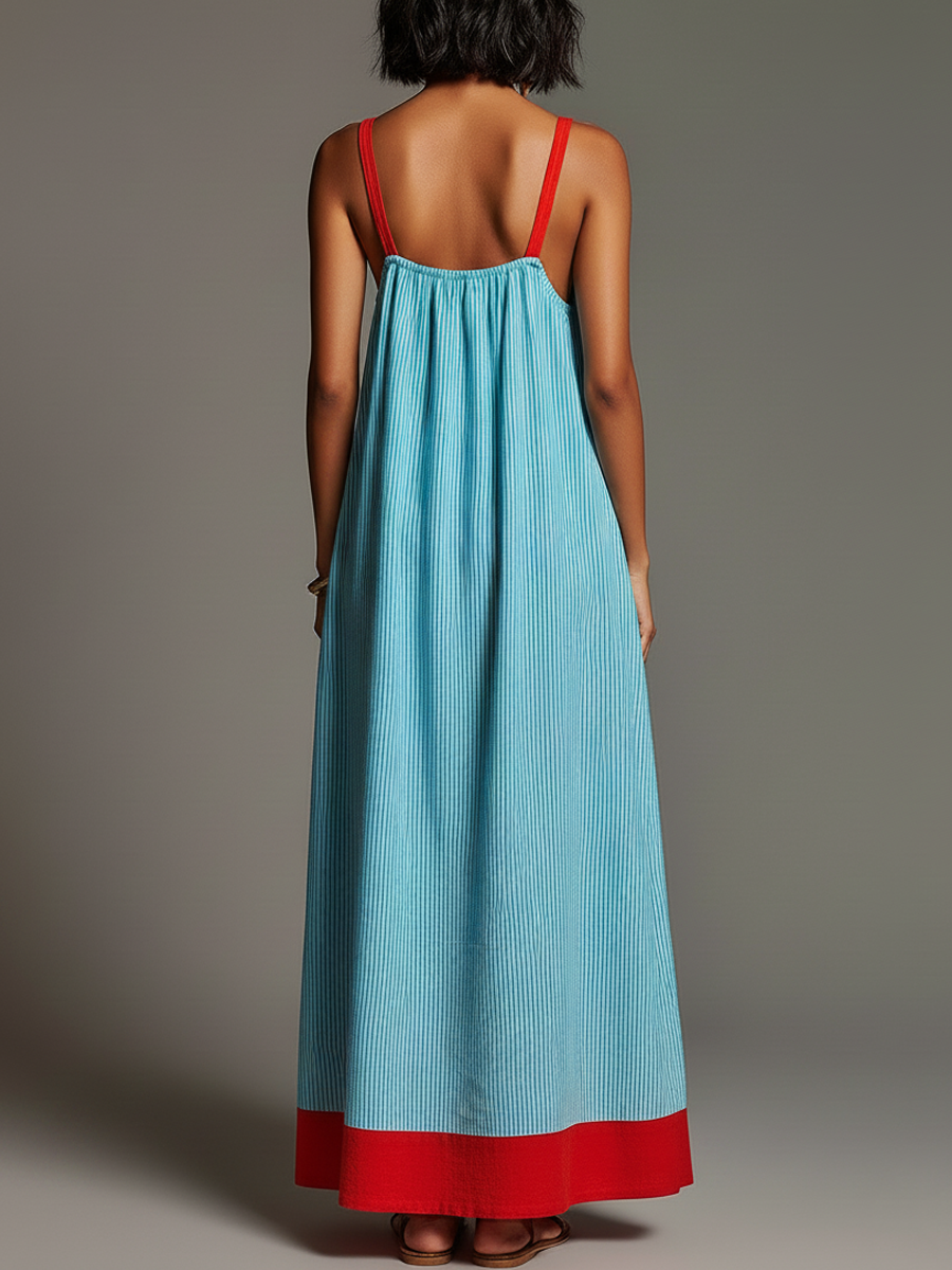 Abito estivo fluido da donna, taglio maxi, con motivo a righe e pratiche tasche. Perfetto per la moda mare.