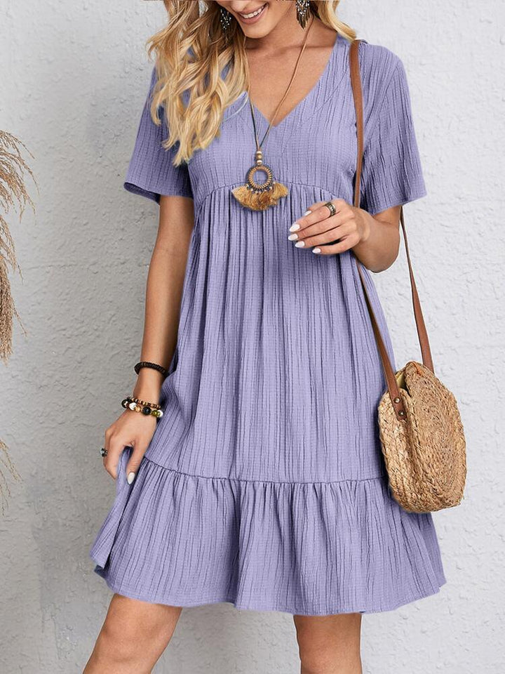 Abito donna elegante, vestito midi con effetto modellante. Perfetto per un look raffinato e confortevole estivo.