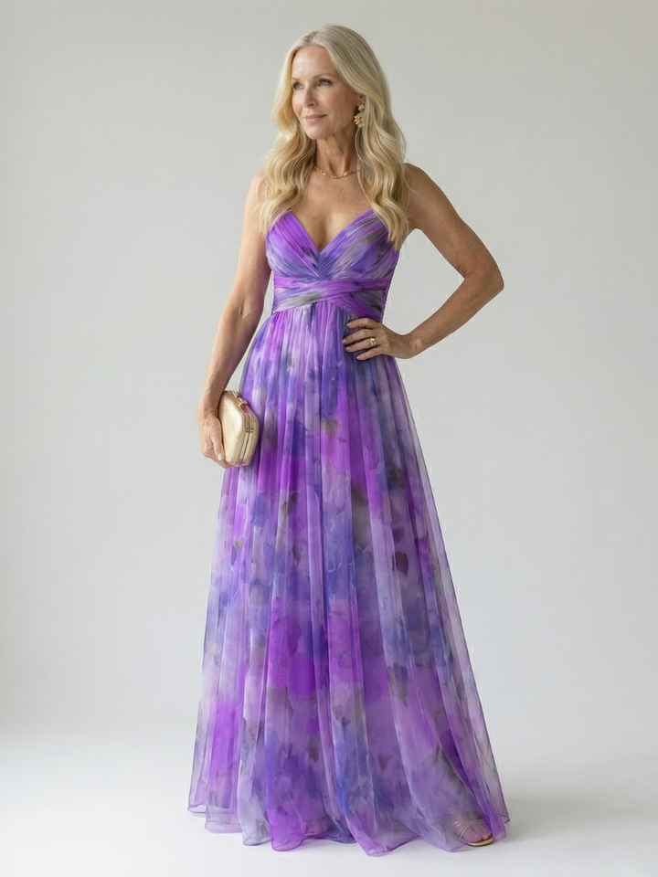 Vestito donna maxi incrociato, tessuto fluido e leggero, per un look estivo sofisticato e rilassato.