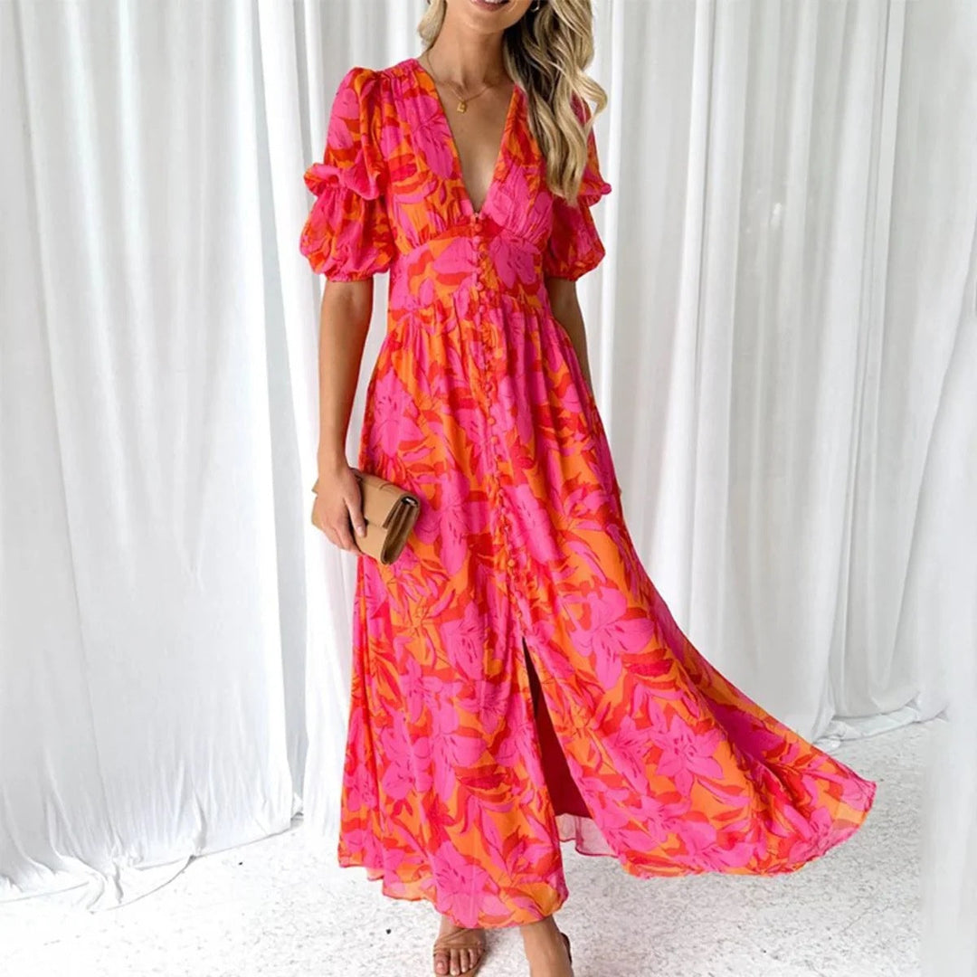 Abito Midi donna elegante rosso con scollo a V, maniche corte e vivace stampa artistica. Perfetto per un look casual chic.