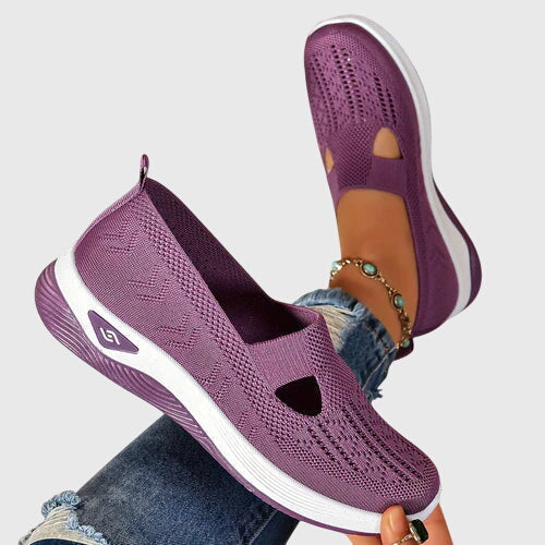 Sneakers slip on donna in tessuto traspirante, suola spessa per comfort e aderenza, ideali per l'estate.