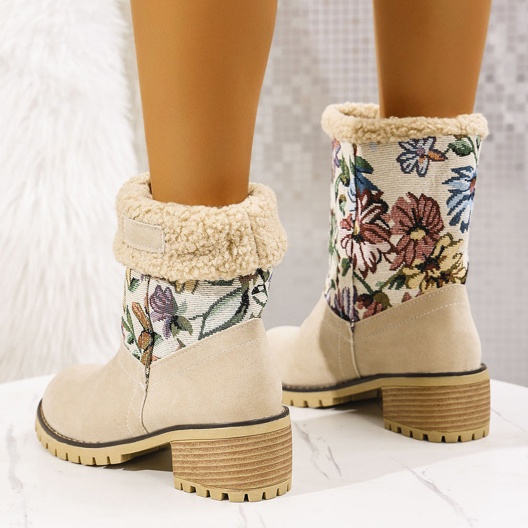Stivali invernali donna eleganti, mezza gamba con un raffinato ricamo floreale. Tacco quadrato per un look chic e confortevole.