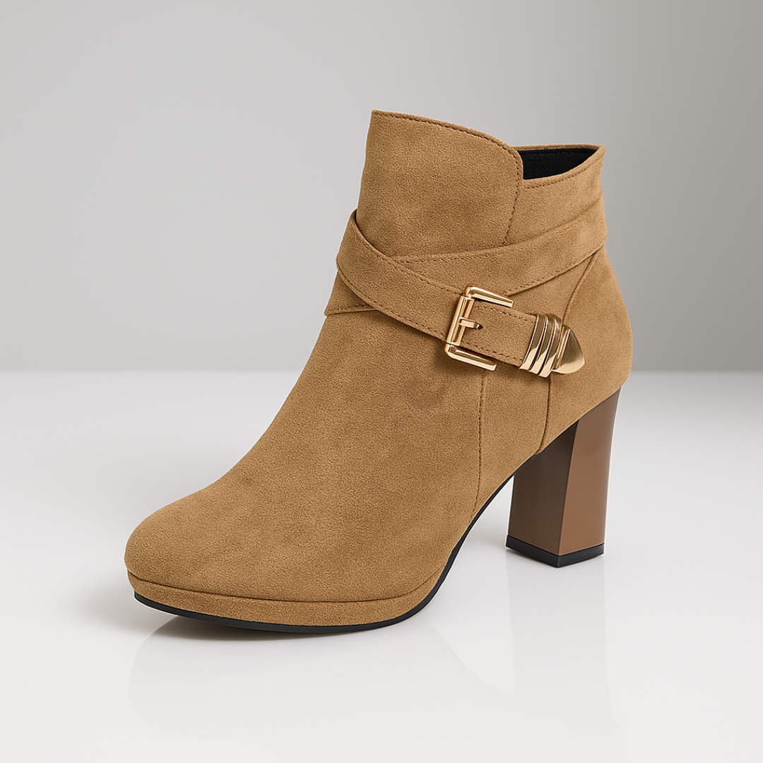 Stivaletti donna autunno di moda, vista laterale. Fascia avvolgente e fibbia oro per un look casual-elegante.