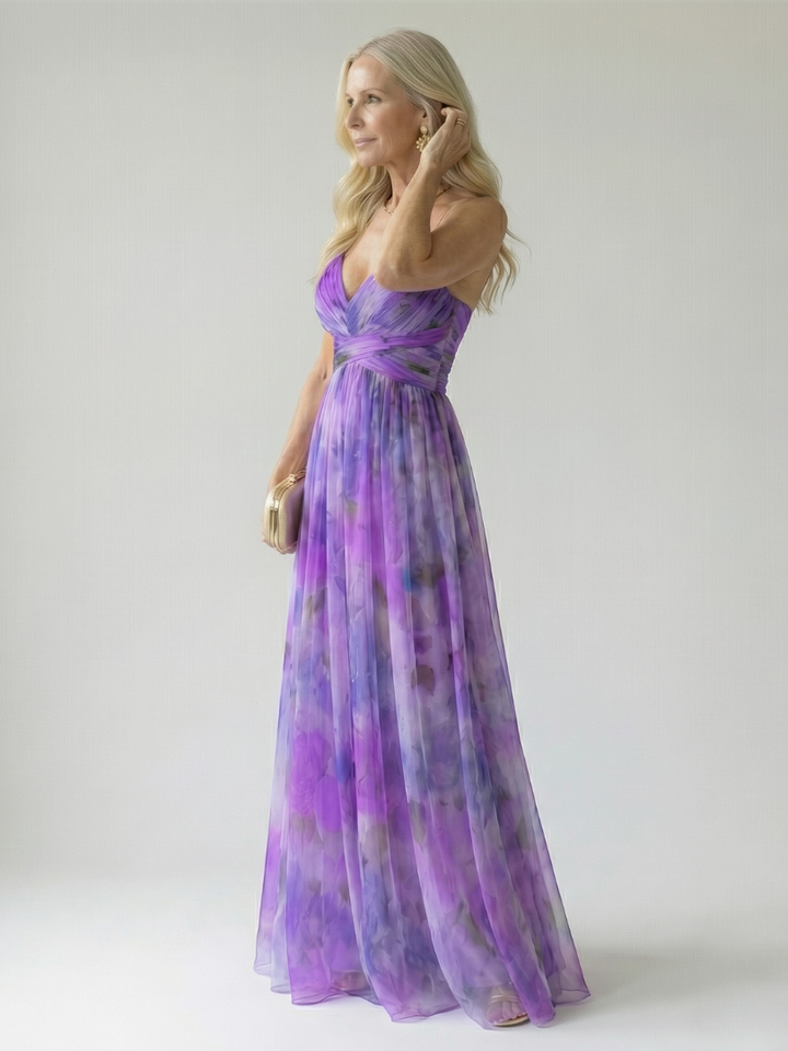 Abito lungo fluido da donna, con scollo incrociato. Perfetto per la moda estiva elegante e casual.