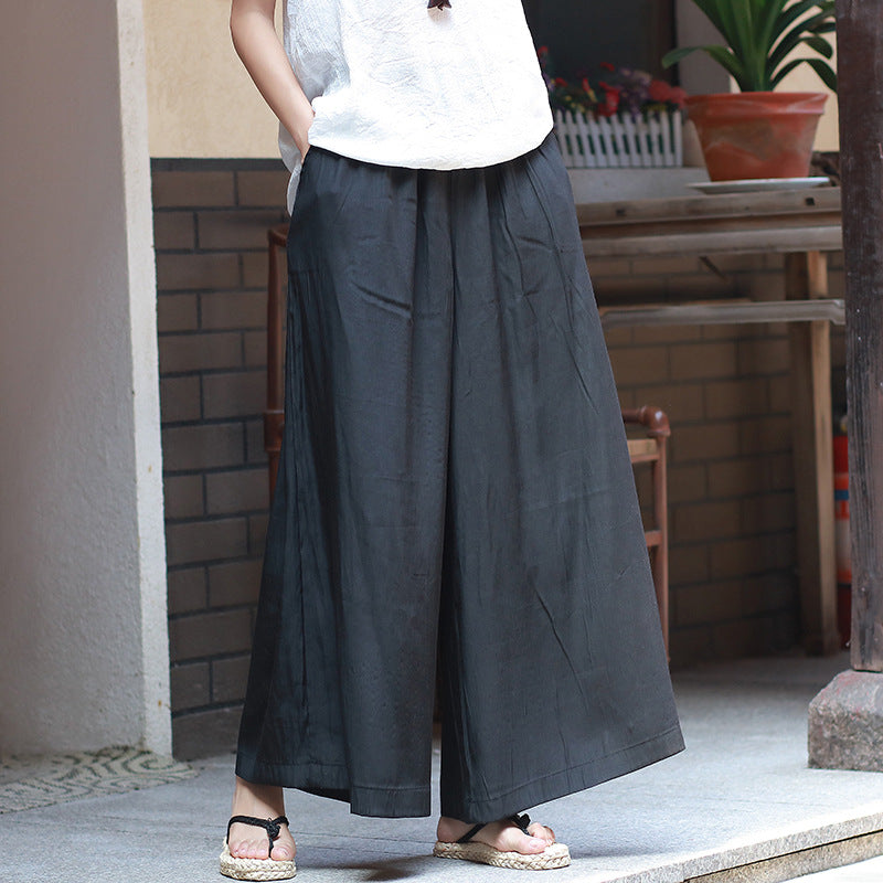 Pantaloni ampi per donna, in tinta unita, che combinano comfort, stile e praticità.