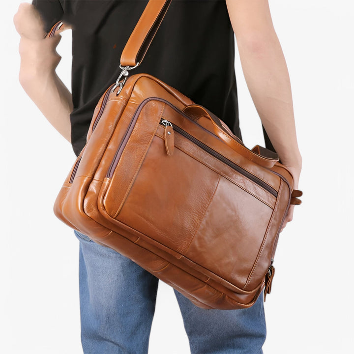 Borsa lavoro uomo professionale in pelle marrone scuro, con scomparto imbottito per laptop, perfetta per l'ufficio.