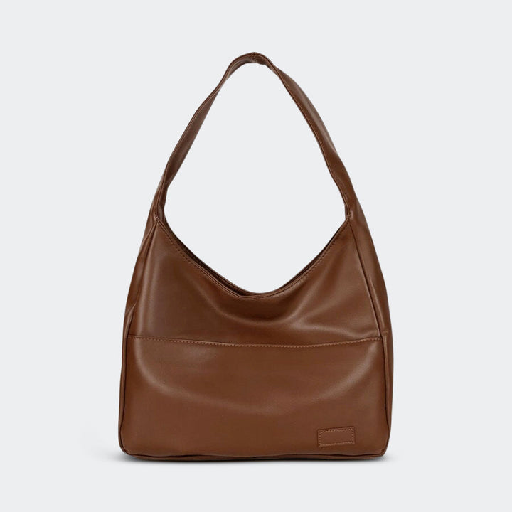 Borsa spaziosa da donna, pelle durevole premium, perfetta per accessori quotidiani.