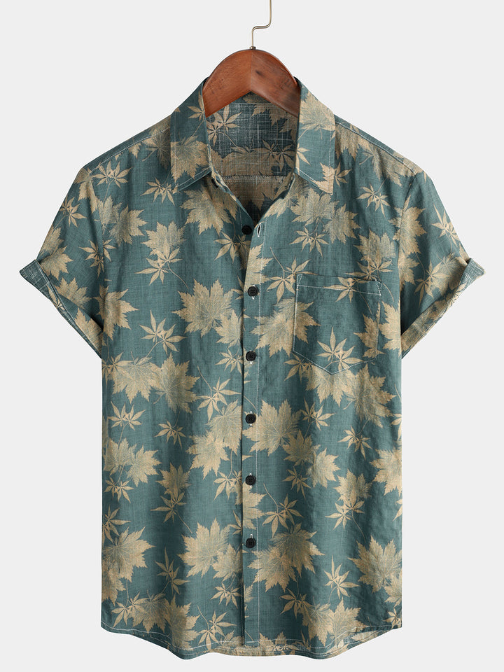 Camicia verde militare uomo, stampa tropicale a maniche corte. Ideale per un look estivo casual.