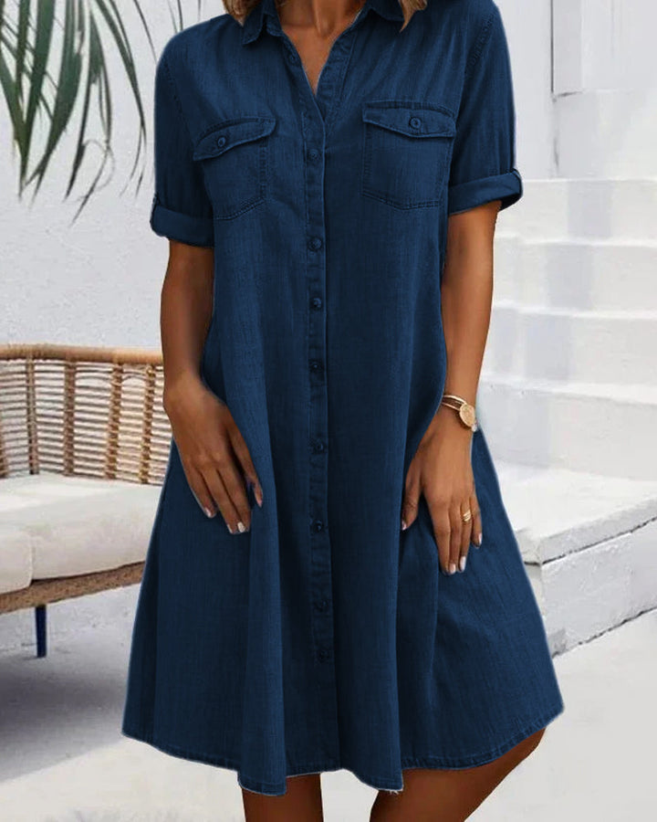 Elegante abito midi blu navy da donna con bottoni frontali e colletto a revers per ogni occasione.