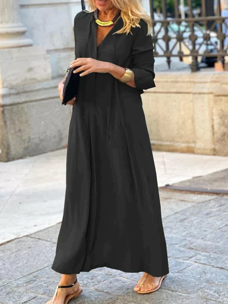 Maxi abito estivo fluido e comodo da donna, ideale per un look casual ma raffinato durante la moda estiva.
